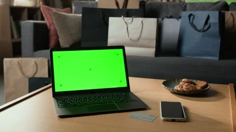 Laptop with Green Screen Display for Online Shopping Mockup Stock Footage 345218215