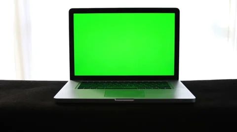 Laptop with Green Screen Isolated on Whi... | Stock Video | Pond5