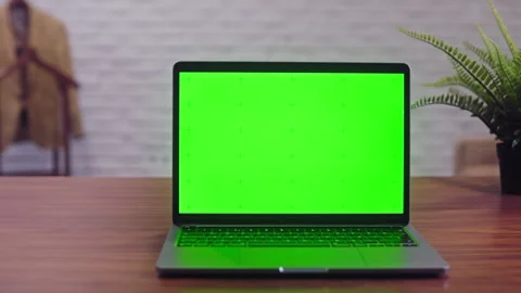 Laptop with a green screen on it Stock Footage 242450426