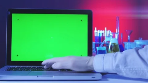 Laptop with a Green Screen in the Laboratory Видео 71655945