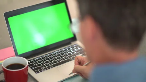 Laptop green screen man back 1 Stock Footage 201008102