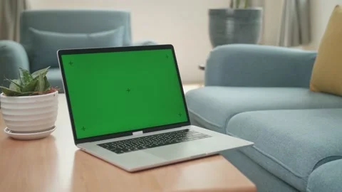 Laptop With Green Screen Mock Up Display At Home Living Room Stock Footage 153067514