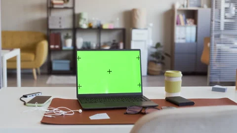 Laptop with Green Screen Mockup Sitting on Desk in Modern Office Stock Footage 341559566