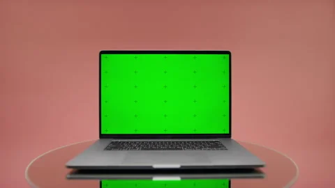 Laptop Green Screen Pack Shot with Copy Space on Pink Stock Footage 334104887