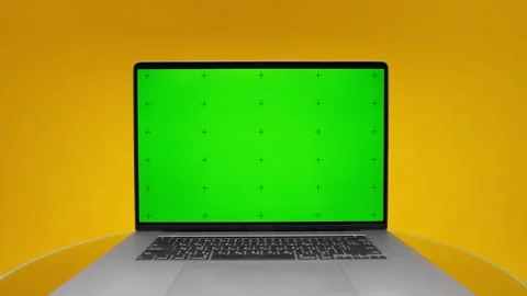 Laptop Green Screen Pack Shot on Yellow Stock Footage 334105242