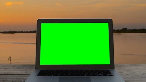 Laptop green screen with sunset. Stock Footage 95346363