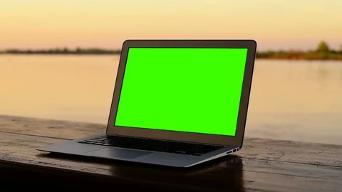 Laptop green screen with sunset. Stock Footage 95382433