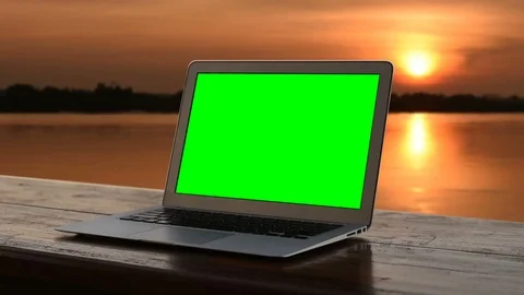 Laptop green screen with sunset. Stock Footage 95389430