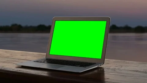 Laptop green screen with sunset. Video stock 95389565