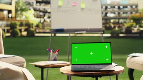 Laptop green screen on table in clean empty rooftop office terrace Stock Footage 338379690