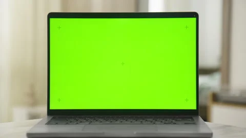 Laptop with Green Screen on Table Ready for Custom Content Display Stock Footage 290508152