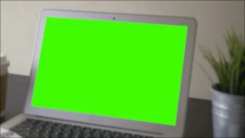 Laptop Green Screen on table work place Stock Footage 76424501
