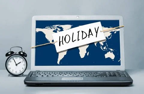 Laptop with holiday note laptop with note about holiday Copyright: xZoonar... Stock Photos