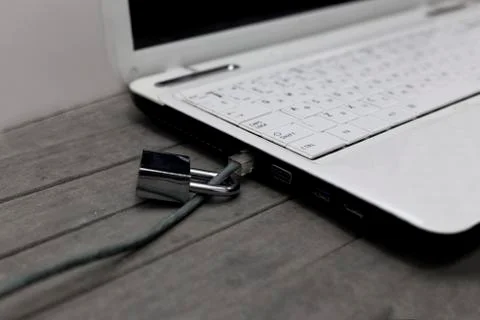 Laptop Internet security with lan cable on combination lock. Stock Photos