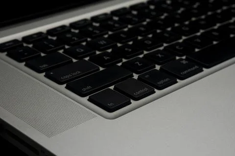 Laptop keyboard background. Computer keys typing alphabet. Closeup buttons... 库存照片