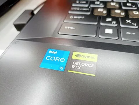 Laptop keyboard with intel core i5 and nvidia geforce rtx stickers 스톡 사진
