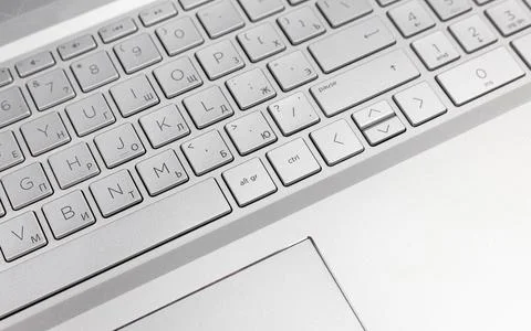 Laptop keyboard layout close up. Copy space Stock Photos