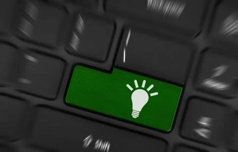 Laptop keyboard with light bulb symbol Stock Photos