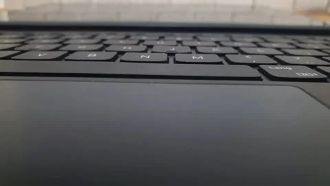 Laptop keyboard or tablet PC keyboard close up, camera moving from right to.. Video stock 279295012