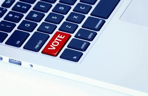 Laptop keyboard with a red vote button Stock Photos
