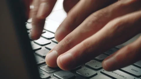 Laptop keyboard typing. Close up shot of hands touch typing on a laptop keyboard Stock Footage 87379970