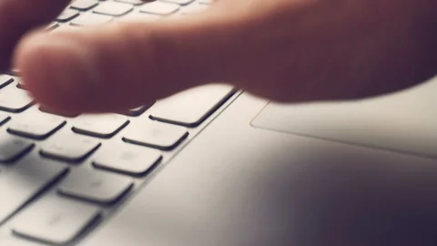 Laptop keyboard typing. Close up shot of hands touch typing on a laptop keyboard Stock Footage 87775959