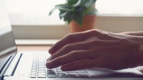 Laptop keyboard typing. Close up shot of hands touch typing on a laptop keyboard Stock Footage 87776124