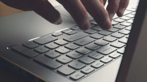 Laptop keyboard typing. Close up shot of hands touch typing on a laptop keyboard Stock Footage 87777952