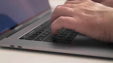 Laptop keyboard typing. Hands touch typing on a laptop keyboard Stock-Footage 74201520