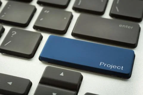 Laptop keyboard with typographic PROJECT button Stock Photos