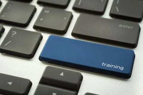 Laptop keyboard with typographic TRAINING button Stock Photos