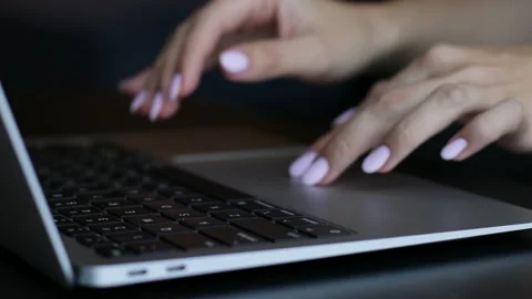 Laptop keyboard, women's hands type text, text typing, static frame, close-up Stock Footage 225330015