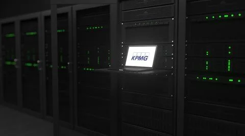 Laptop with the logo of KPMG on the screen in a server room. Conceptual 스톡 일러스트
