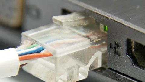 Laptop macro LAN network cable 4k Stock Footage 112700832