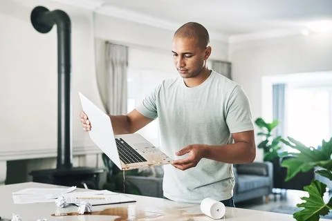 Laptop, man and coffee spill with mistake in home for accident, remote work.. 스톡 사진