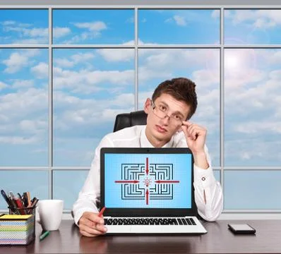 Laptop with maze on screen Foto stock