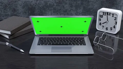 Laptop Mock-Up on work desk. book with watch and glasses on table. Stock Footage 172461864
