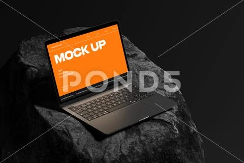Laptop Mockup on Stone Surface PSD Template