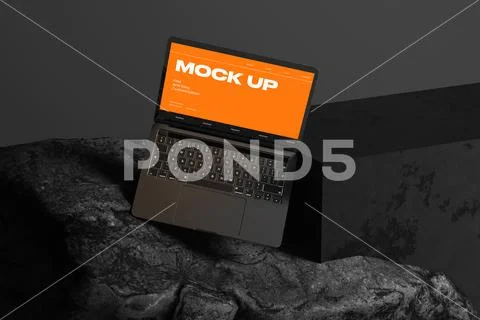 Laptop Mockup on Stone Surface PSD Template