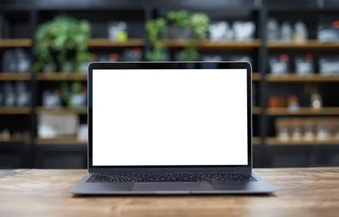 Laptop mockup template with empty screen against shelving Stock Photos