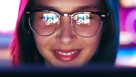 Laptop, neon and reflection in glasses with happy woman online for design or Stock Footage 331425031