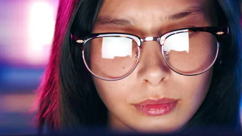 Laptop, neon and reflection in glasses with woman online for design or Stock Footage 331470060