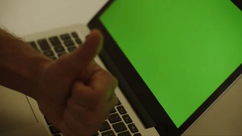 Laptop Notebook hand showing thumbs up green screen 4 up shot  Vídeo Stock 303592463