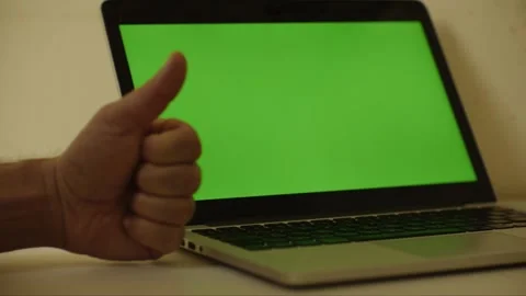 Laptop Notebook hand showing thumbs up green screen 11 left side shot  Vídeo Stock 303592477