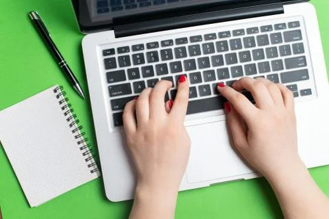 Laptop with notepad and pen Stock Photos