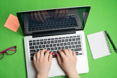 Laptop with notepad and pen Stock Photos