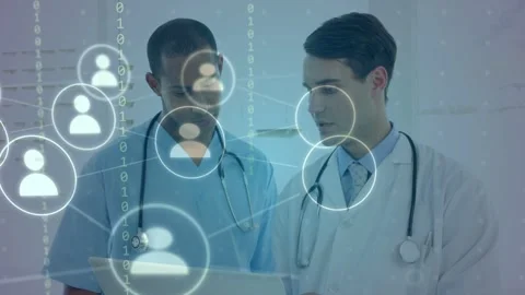 Laptop notifying, two clinicians consulting while network nodes expanding, Stock Footage 332981437