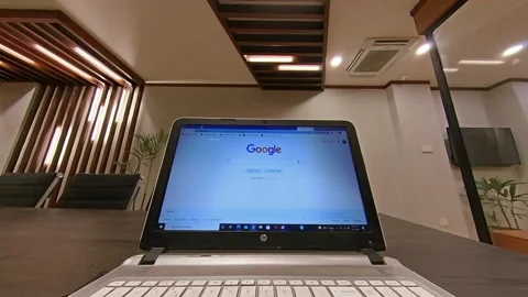 Laptop in an office in which google page is open. Stock Footage 172540086