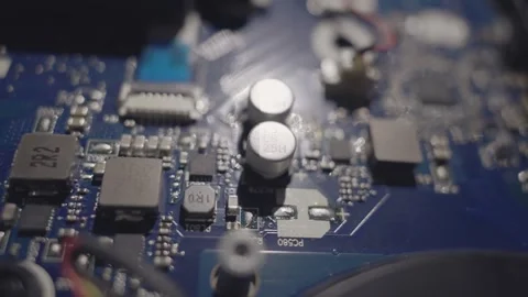 A laptop is open and the battery is removed with mother board components visi Stock Footage 344909431