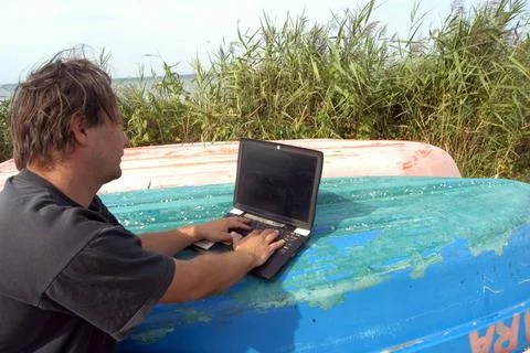  a laptop or notebook, mobile computer device with screen and rechargeable... Stock-Fotos